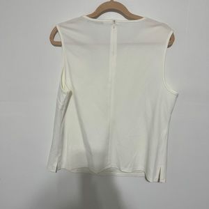 I love Tyler Madison white blouse sleeveless